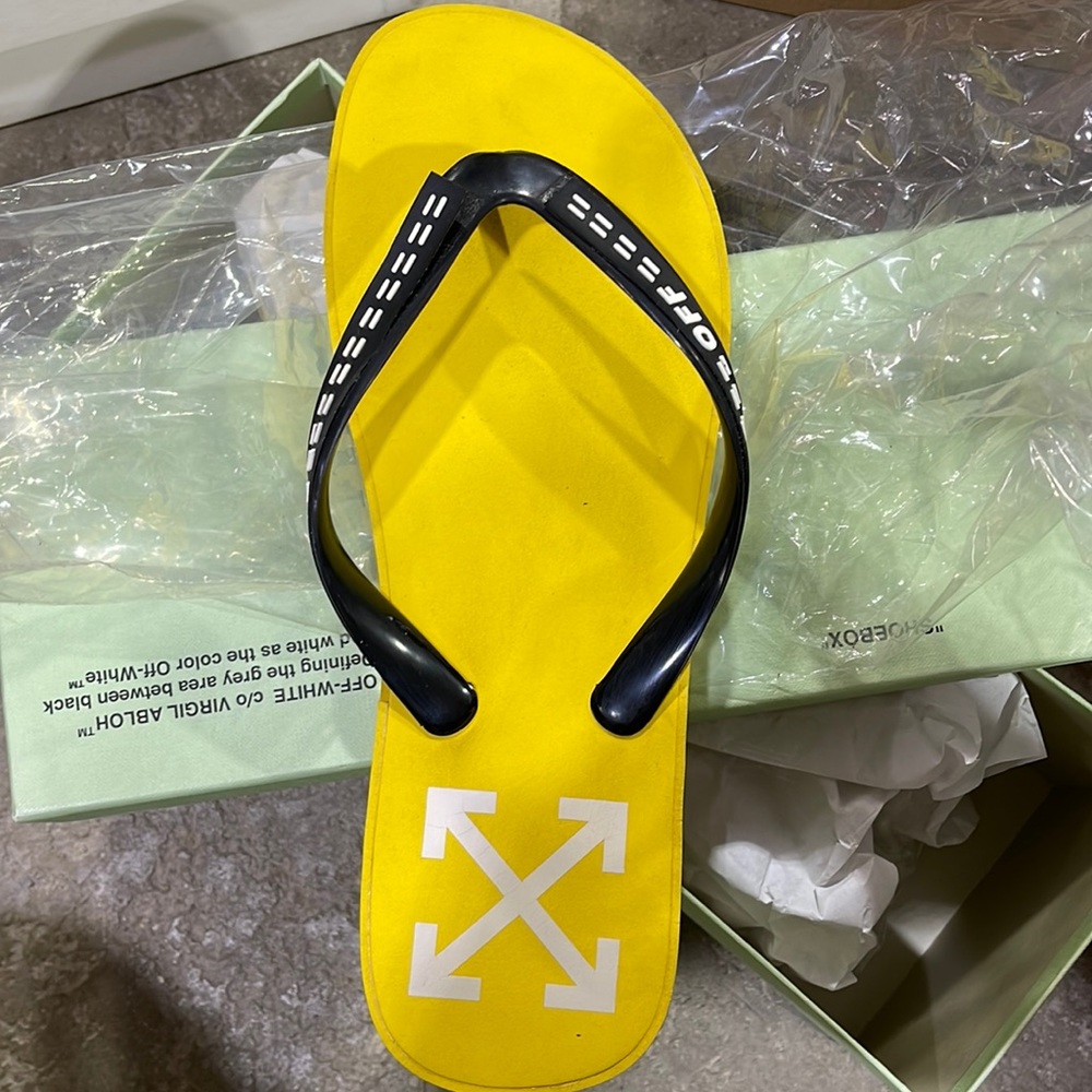 Off White yellow and black flip flops